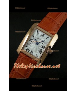 Cartier Tank Française para damas malla marrón con estuche dorado.